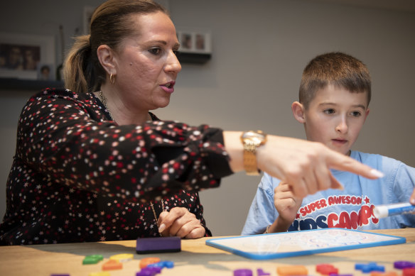 Sam Rogers, age 9, from St Charles Catholic Primary School in Waverley, is tutored in maths by Fay Ligonis from Super Kids Tutoring.