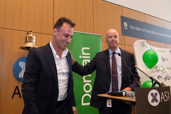 Fairfax Media chief executive Greg Hywood (right) congratulates Antony Catalano when Domain listed on the ASX in 2017.