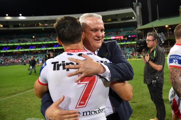 Anthony Griffin and Ben Hunt embrace after the Dragons’ Anzac Day victory.
