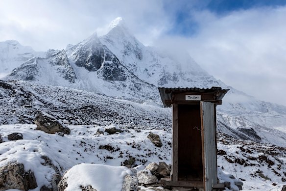 Putting the sass into cistern... outhouse on Everest Base Camp Trek.