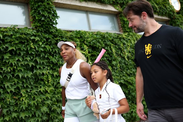 Serena Williams leaves the practice court with daughter Olympia and her husband Alexis Ohanian.