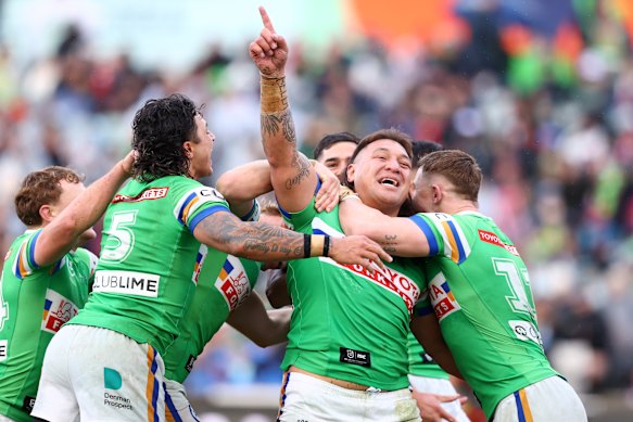 Josh Papalii celebrates scoring a try in his record-equalling 318th game for the Raiders.