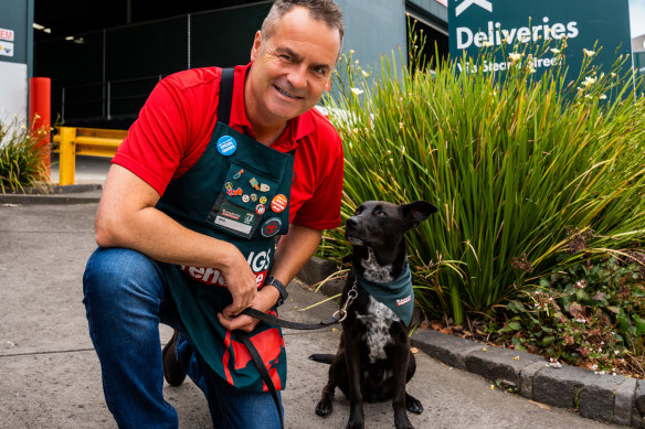 Bunnings boss Michael Schneider with dog Henry. The DIY giant is expanding its pet goods range to  1000 items.