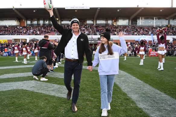 Mark Hughes delivers the match ball before the Sea Eagles-Roosters clash at Brookvale Oval last year.