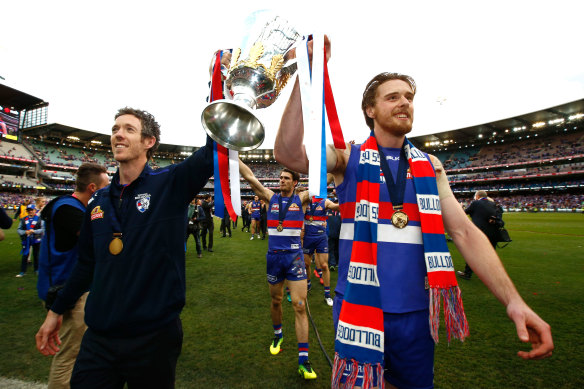 Jordan Roughead (right) and Bob Murphy celebrate the Bulldogs’ 2016 premiership.