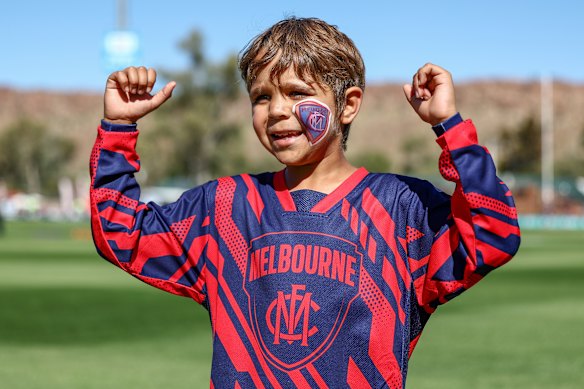 A young Melbourne fan voices his support for the Dees at Alice Springs’ Traeger Park.