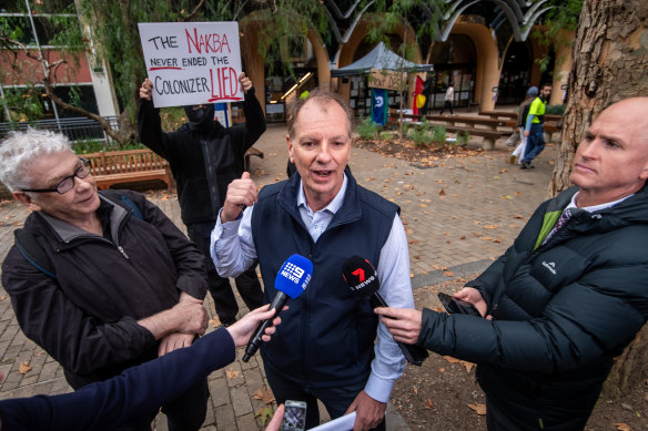 Deputy Opposition Leader David Southwick speaks to the media at the University of Melbourne on Friday.
