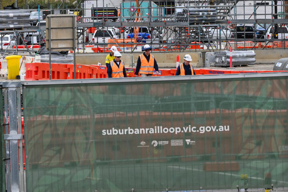 Workers at a Suburban Rail Loop construction site in Heatherton.