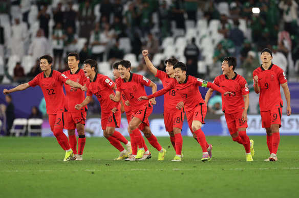 South Korea celebrate after the penalty shootout win over Saudi Arabia.