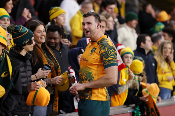 Wallaby Nick Frost interacts with fans at Suncorp Stadium in 2022.