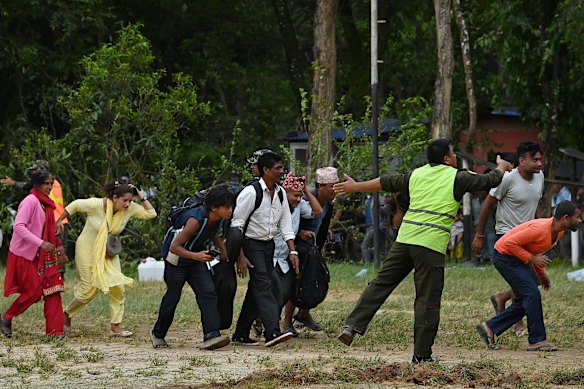 With roads destroyed, helicopter is the only way in and out.