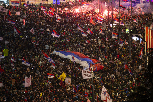 Protesters march during a major rally against Serbian President Aleksandar Vucic on Saturday.