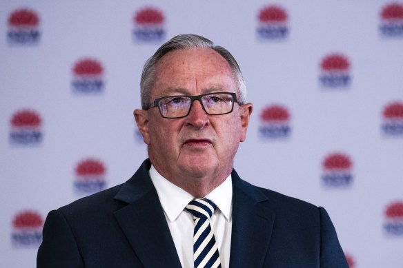 NSW Health Minister Brad Hazzard said it was "appalling" to see a man captured on video being aggressive towards staff at a McDonald's restaurant in north-west Sydney after being asked to use a QR code.