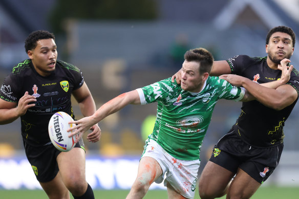 Luke Keary taking on AJ Wallace and Jacob Ogden.