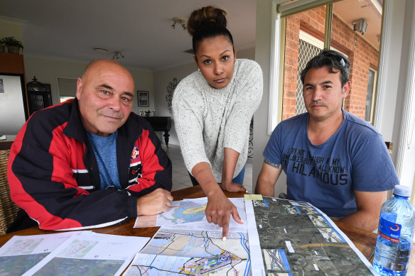 Small landowners Peter Srzich, left and Joanne and Paul Coyto. 