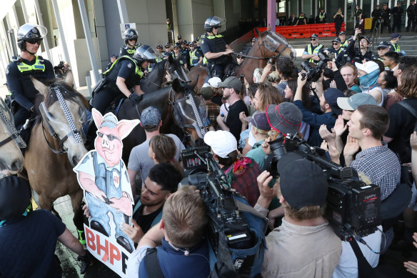 Police clash with protesters outside the IMARC conference in Melbourne.