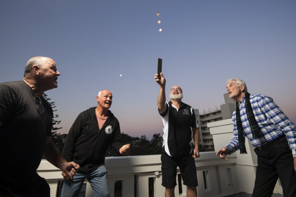 (From left) Sean Dry and friends Tim Reilly, Steve Woodley and Phil Nicol look forward to playing two-up at their pub in Freshwater on Anzac Day.