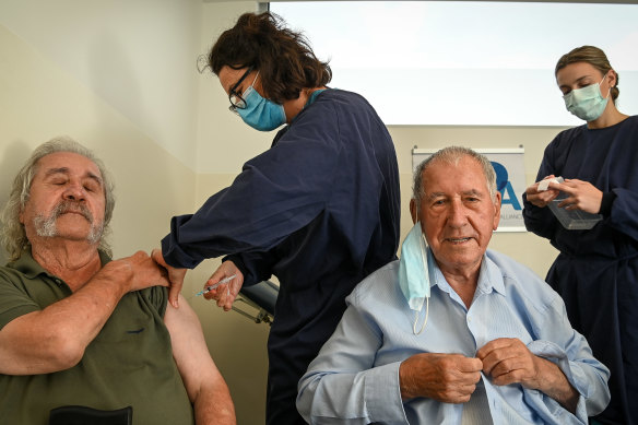John and Jim Manolakakis got their vaccine in March, but many older Australians have held off despite being eligible for vaccination for six months. 