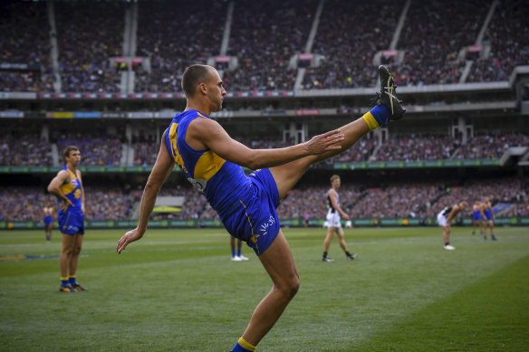 With apologies to Jeremy Howe: West Coast's Dom Sheed threads the needle in the dying minutes of last year's grand final against Collingwood.