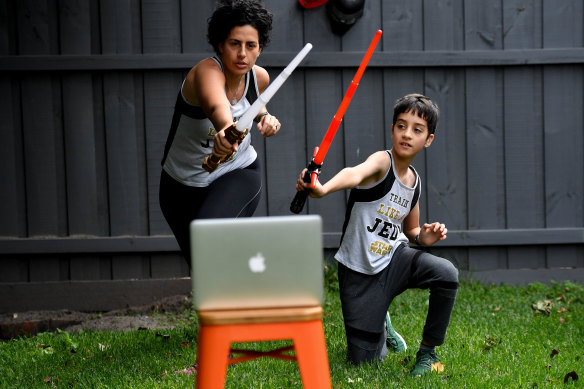 Dani Hersz and her nine-year-old son, Riley, have been doing Star Wars-style workouts together.