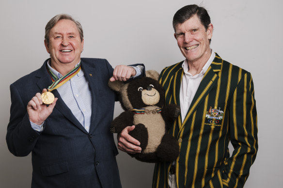 Mark Tonelli, left, with Peter Hadfield, who is pictured in his uniform from the Moscow Olympic Games of 1980. 