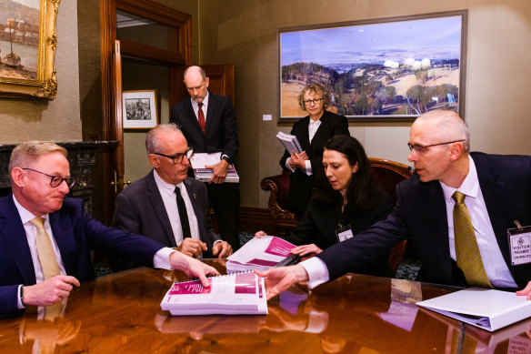 Awkward moment as the president of the Legislative Council Ben Franklin and the Speaker of the Legislative Assembly Greg Piper receive the ICAC’s report.