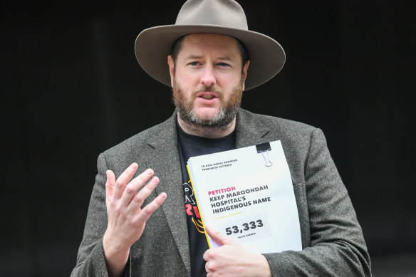 Marcus Stewart, co-chair of the First Peoples’ Assembly, delivering a petition on the Maroondah Hospital name change.