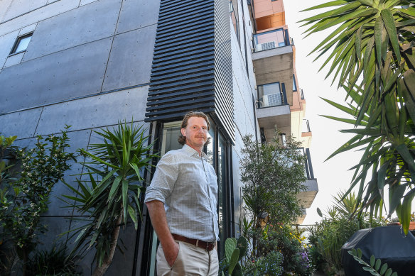 Tony Weir at his Brunswick home, which has been deemed to have flammable cladding - despite evidence it may not.