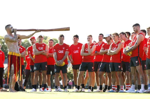 Swans players get an Indigenous performance welcome ahead of their captain’s run on Thursday.