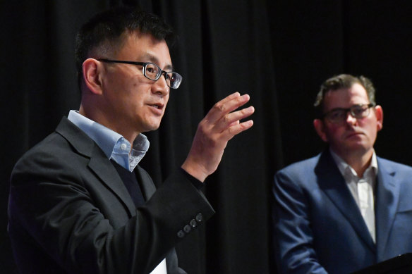 Then-deputy CHO Allen Cheng addresses the media in 2020 as Premier Daniel Andrews watches on.