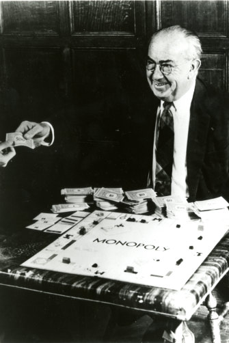 Charles Darrow, the creator of Monopoly as we know it today, with his famous game. 