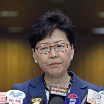 Hong Kong chief executive Carrie Lam vows to push through the new laws despite a strong show of public anger.