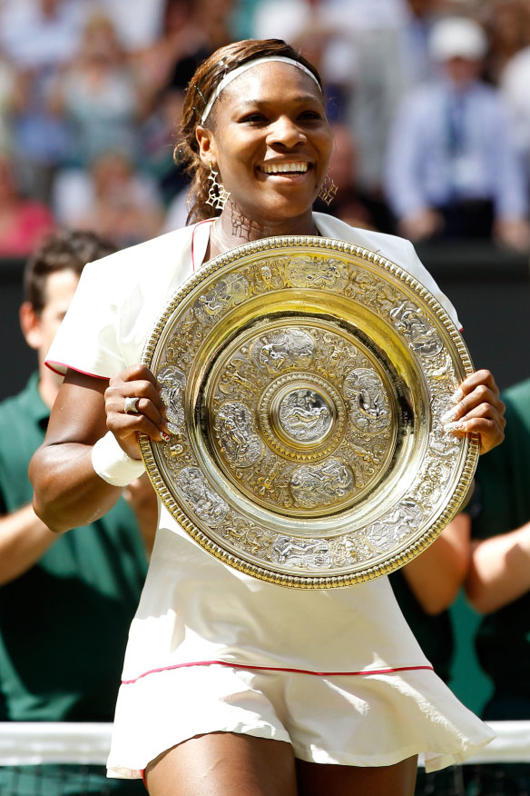 Serena Williams with her winning Wimbledon plate in 2010. 