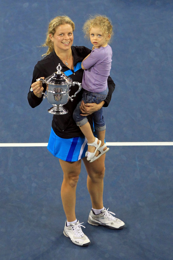 Kim Clijsters poses with her daughter Jada after winning the US Open in 2010.