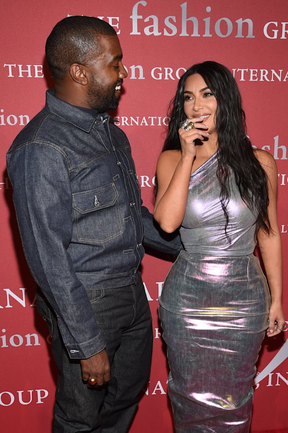 Kanye with wife Kim Kardashian at a fashion gala last week.
