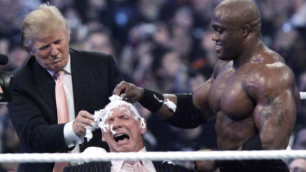Donald Trump and wrestler Bobby Lashley, shave the head of McMahon at Wrestlemania 23.