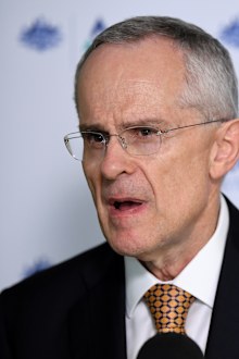Sims says merger law 'damaging productivity'