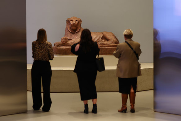 Visitors view the Melbourne Winter Masterpieces exhibition Pharoah at NGV International.