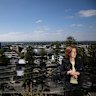 Frankston mayor Sue Baker stands on top of an apartment building overlooking Port Phillip Bay. 