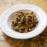 East meets West in a bowl of casarecce with Lao sausage, snake beans and garlic chives.