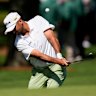 Jason Day chips to the green on the seventh hole during the first round of the Masters golf tournament at the Augusta National Golf Club on Thursday.