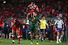 David Fusitu’a of Tonga flies above Josh Addo-Carr of Australia at Eden Park.