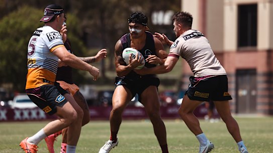 Brendan Piakura in action at Broncos training.