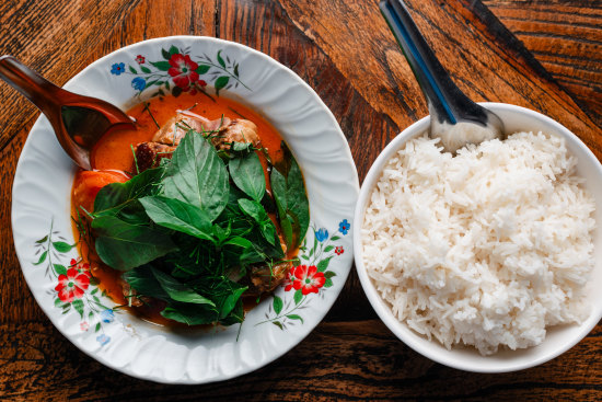 Red curry of barbecue duck with snake bean and sweet basil.