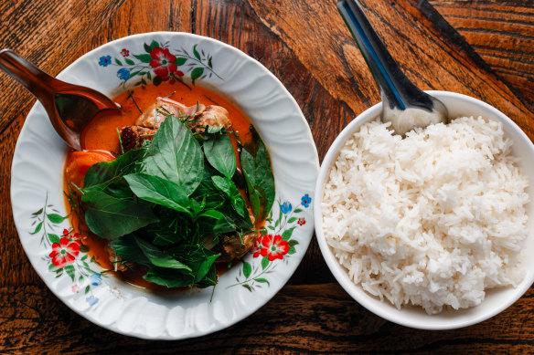 Red curry of barbecue duck with snake bean and sweet basil.