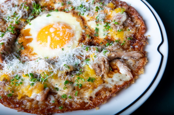 Buckwheat galette with confit duck leg, egg, gruyere and kumquat shoyu.