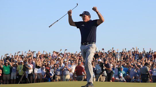 Phil Mickelson celebrates his record-breaking PGA Championship victory.