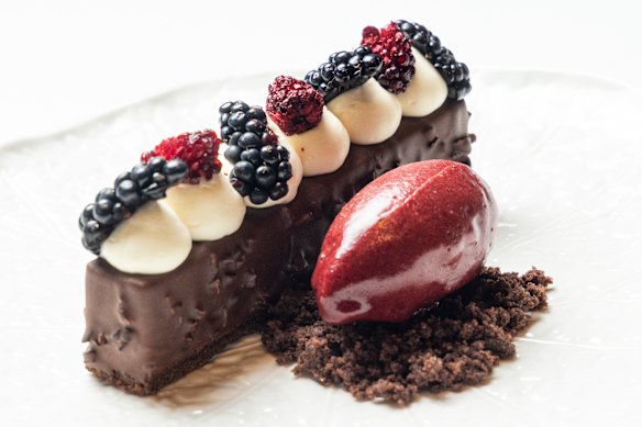 Chocolate mousse encased in a tempered chocolate shell.