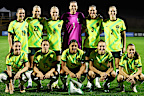 Matildas take a team photo before their clash with Haiti.