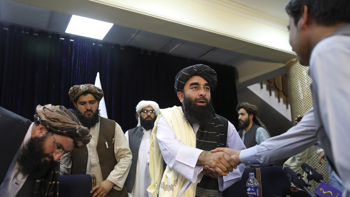 The Taliban is a lot more media savvy now. Its spokesman Zabihullah Mujahid, shook hands with a journalist after his first news conference, in Kabul on  Tuesday.